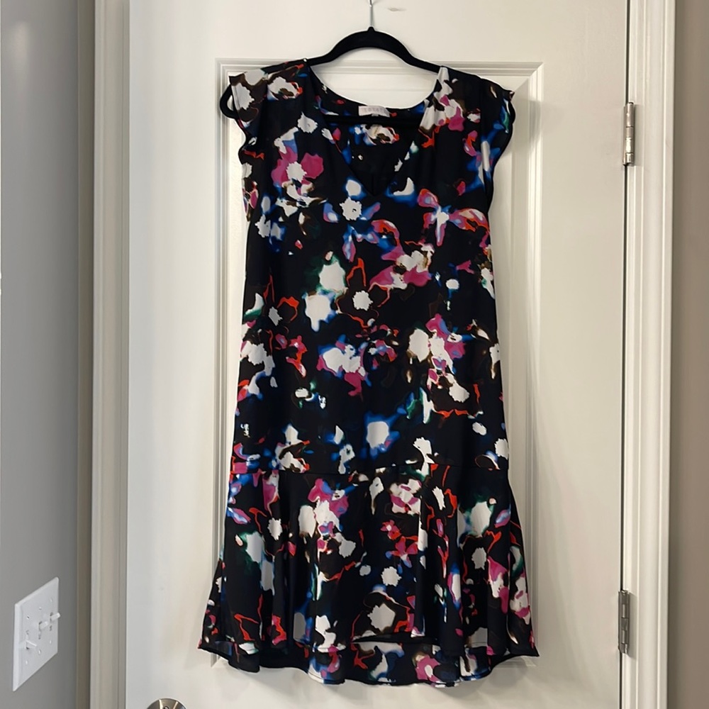 1 State - black floral with flutter sleeves. Size Small